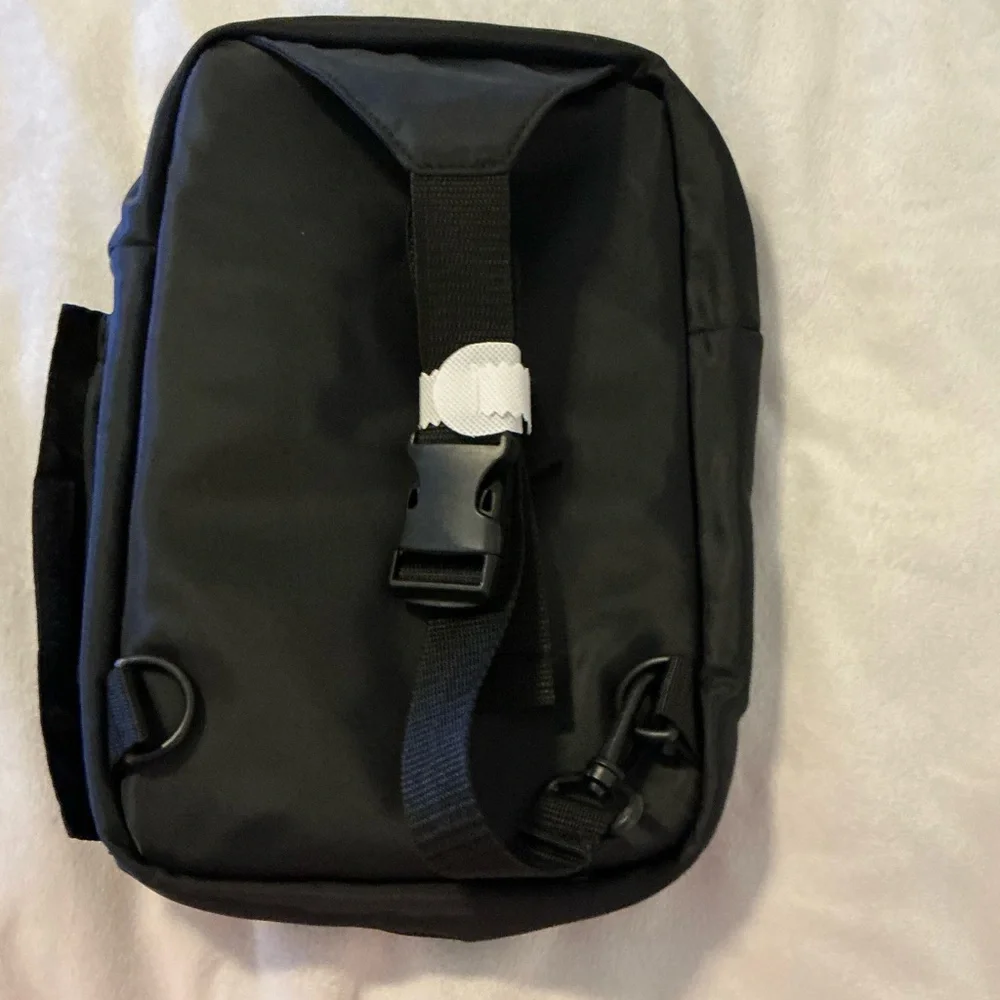 Sling backpack.New DSW